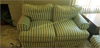 blue and white striped love seat and couch