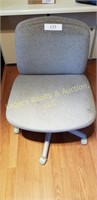 Grey cloth swivel chair
