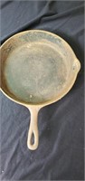 Cast iron skillet approx 10 inches diameter