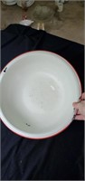 Enamelware bowl with red trim approx 12 inches