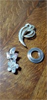 Silver colored broaches