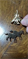 Christmas tree pin and Zebra pin