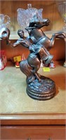 Bronze colored lone ranger style man on horse