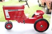 Farmall 806 pedal tractor (has been restored)