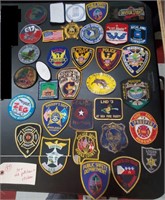 30+ old patches and stickers all different