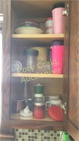 Contents of Cabinet Assorted glasses, tupperware