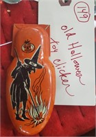 Vintage tin litho 4" clicker toy Halloween witch