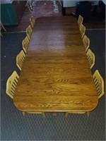 Long Oak clawfoot Table with 10 Chairs