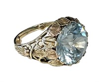 YELLOW GOLD RING W/ 10 CARAT BLUE ZIRCON