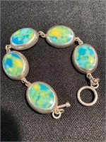Bracelet with interesting colored stone set in