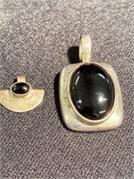 Two pendants with stones set in sterling silver