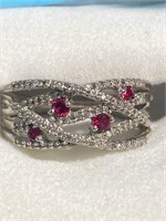 Ruby and white topaz ring set in sterling silver