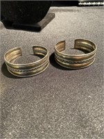 Matched pair of sterling silver bracelets