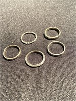 Five sterling silver rings