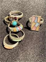 Six sterling silver rings with colored stones