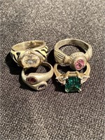 4 sterling silver rings with colored stones