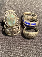 Five sterling rings - two with colored stones, one