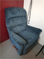 Rocking upholstered recliner