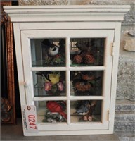 Lenox decorated Birds and a white wooden showcase
