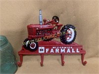 Cast iron Farmall Case I-H tractor coat rack