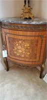 Ornate corner cabinet