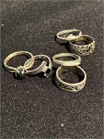 Six sterling silver rings