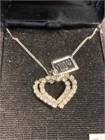 Double heart pendant on a chain that is the