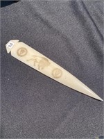Native style designs on a imitation spearpoint