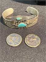 Two southwest turquoise cuff bracelets and two
