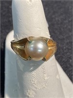Pearl ring marked 10 KGF. Size 6 1/2