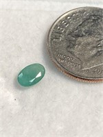 Small cut emerald colored stone