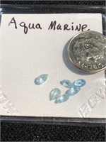 Six aquamarine cut stones