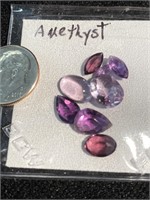 Group of amethyst faceted stones