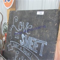 "Love is sweet" sign