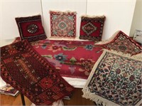 Small Oriental Rugs and Pillows.