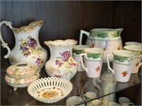 CHINA PITCHERS AND FLORAL PIECES