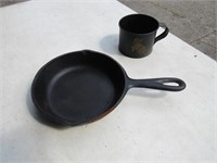 cup & cast iron skillet