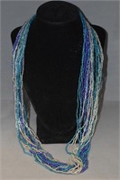 2 Multi Strand Beaded Necklaces