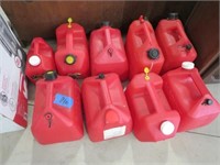 9 assorted gas cans & 1 cabinet