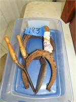Horse shoes & antique hair curlers