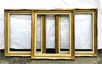 Three large matching gold picture frames