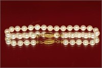 18 KY Gold and pearl bracelet.