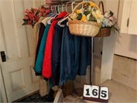 clothing rack with clothes and contents