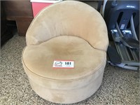 Upholstered tan chair (round); 360 degree swivel
