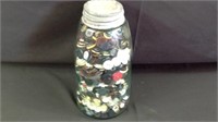 1 quart atlas jar filled with vintage buttons