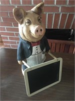 Pig Holding Chalk Board