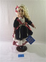 Blonde Haired Doll In Blue Coat