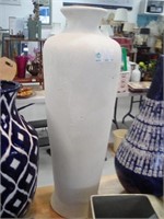 tall concrete vase