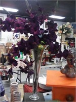 Large vase of purple gladiolas