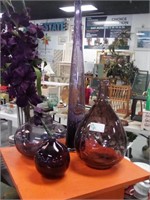 Set of 4 purple glass vases